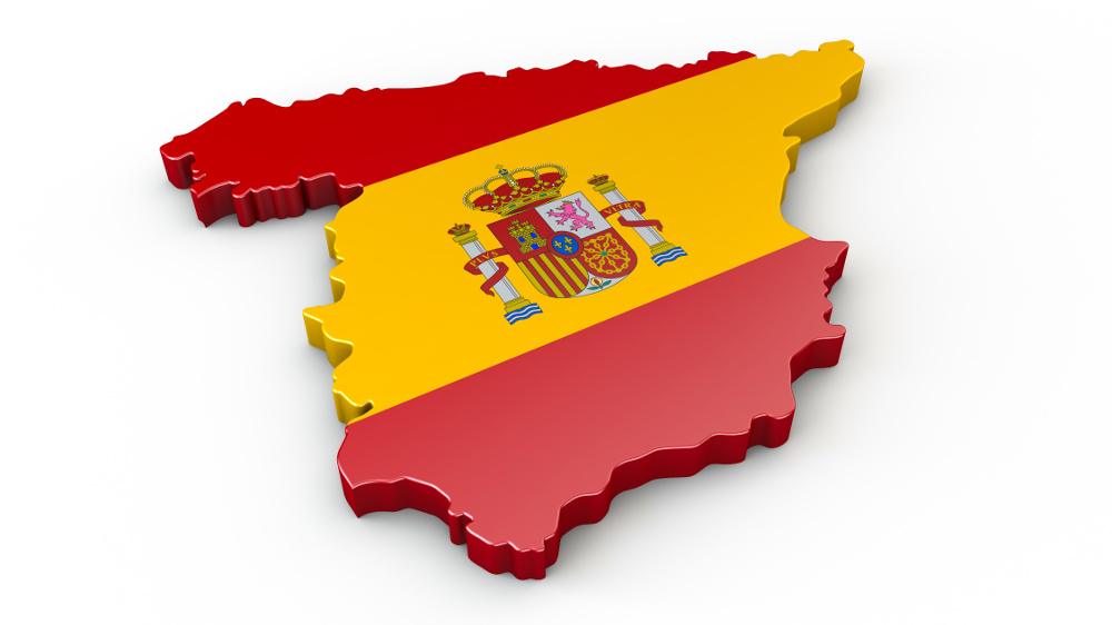 Geografische Umrisse Spaniens in den Farben der Nationalflagge.