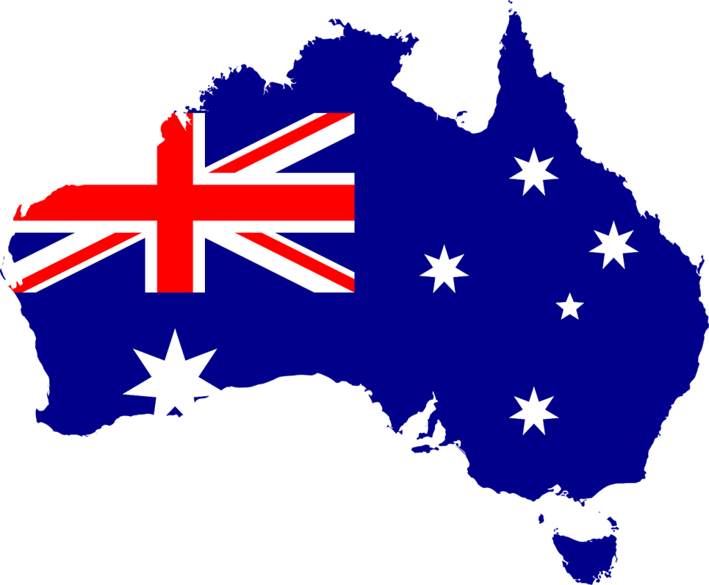 Geografische Umrisse Australiens in den Farben der Nationalflagge.